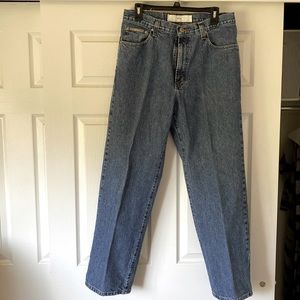 Men’s faded blue jeans.